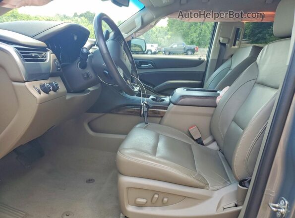 1GNSKBKC9KR213220 2019 CHEVROLET TAHOE Gray Widok wnętrza z przodu