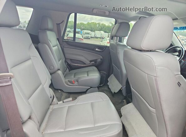 1GNSKBKC9KR308019 2019 CHEVROLET TAHOE White Widok wnętrza z tyłu