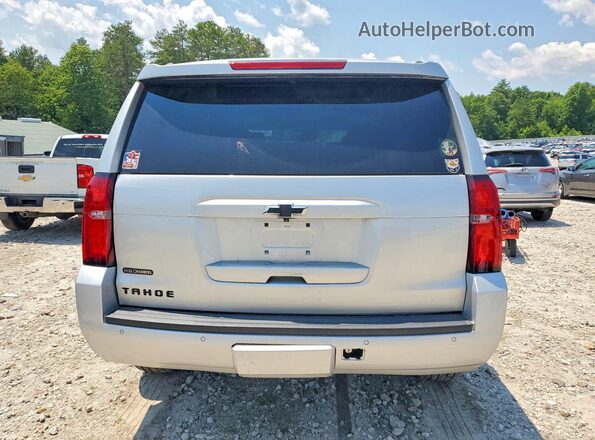 1GNSKBKCXLR275694 2020 CHEVROLET TAHOE Серебряный Вид сзади