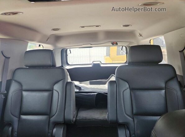 1GNSKCKC1JR103475 2018 CHEVROLET TAHOE Black Vista de los asientos traseros