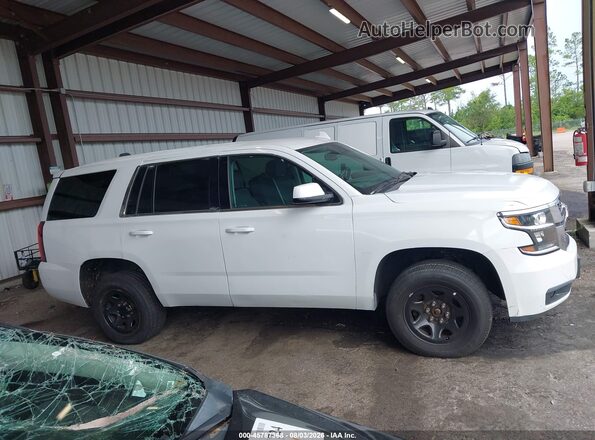 1GNSKDEC6LR225432 2020 CHEVROLET TAHOE Black Սալոնի հետևի տեսք