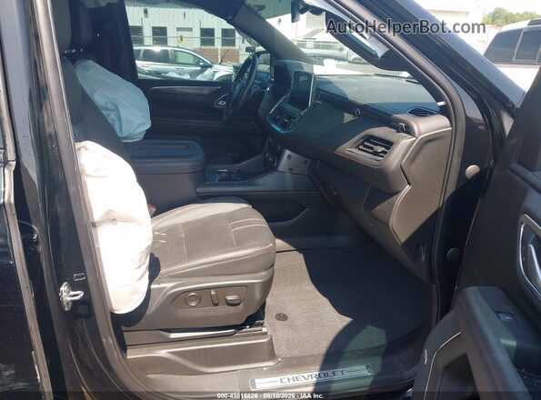 1GNSKEKD9PR125091 2023 CHEVROLET SUBURBAN Черный Вид салона спереди