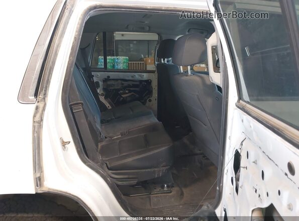 1GNSKFEC0KR221399 2019 CHEVROLET TAHOE White VIN կոդի պիտակի տեսք