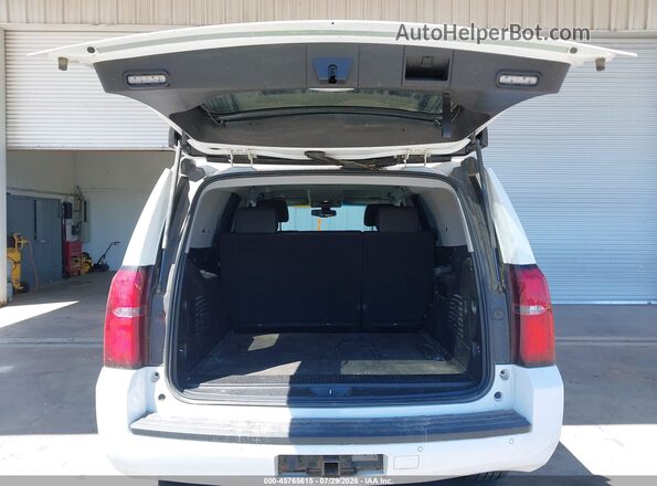 1GNSKFEC9JR354788 2018 CHEVROLET TAHOE White Vista del cuadro de instrumentos