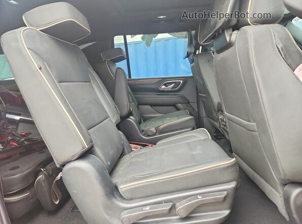 1GNSKFKT0PR487341 2023 CHEVROLET SUBURBAN Бордовый Вид задних сидений