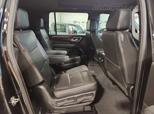 1GNSKGKL1PR128666 2023 CHEVROLET SUBURBAN Black Widok wnętrza z tyłu