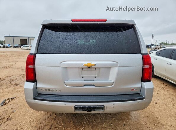 1GNSKHKC0LR284021 2020 CHEVROLET SUBURBAN Серебряный Вид сзади