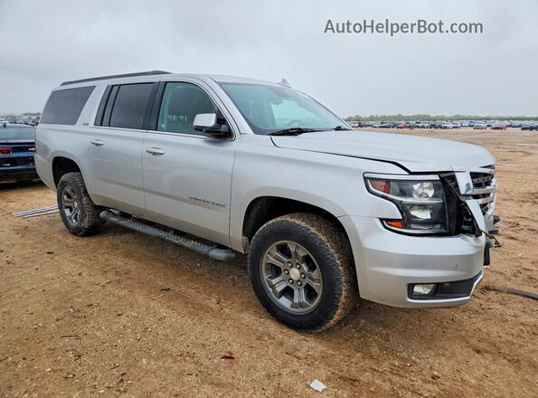 1GNSKHKC0LR284021 2020 CHEVROLET SUBURBAN Серебряный Передняя правая четверть