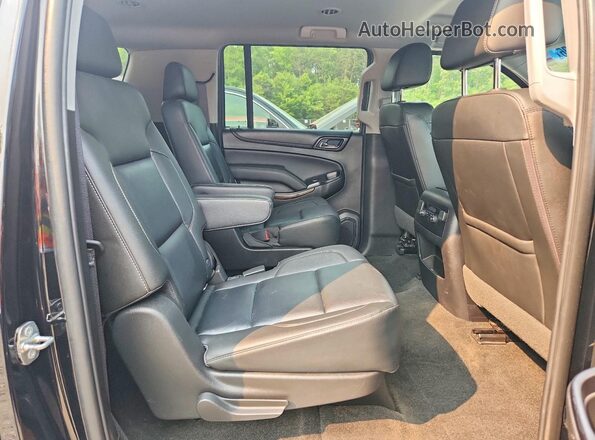 1GNSKHKC7JR384811 2018 CHEVROLET SUBURBAN Черный Вид задней части салона