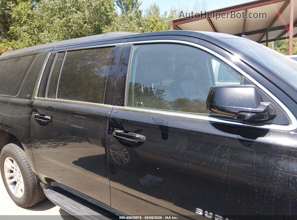 1GNSKHKC7LR260833 2020 CHEVROLET SUBURBAN Black უკანა სალონის ხედი