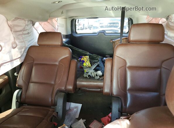 1GNSKJKC4GR100034 2016 CHEVROLET SUBURBAN Gold Widok tylnych siedzeń