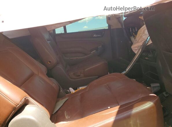 1GNSKJKC4GR100034 2016 CHEVROLET SUBURBAN Gold Widok wnętrza z tyłu