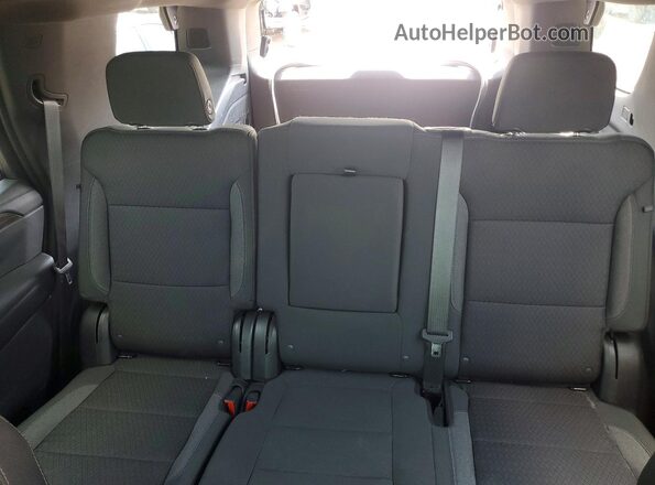 1GNSKLED6PR150241 2023 CHEVROLET TAHOE Silver Rear seats view