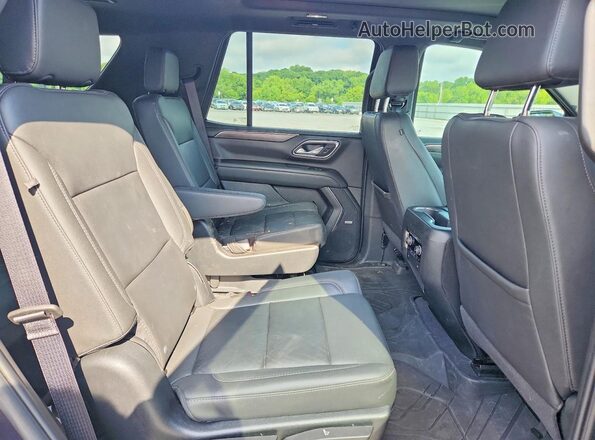 1GNSKNKDXPR404940 2023 CHEVROLET TAHOE Черный Вид задней части салона