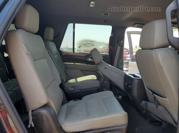 1GNSKPKD9NR302540 2022 CHEVROLET TAHOE Black Սալոնի հետևի տեսք