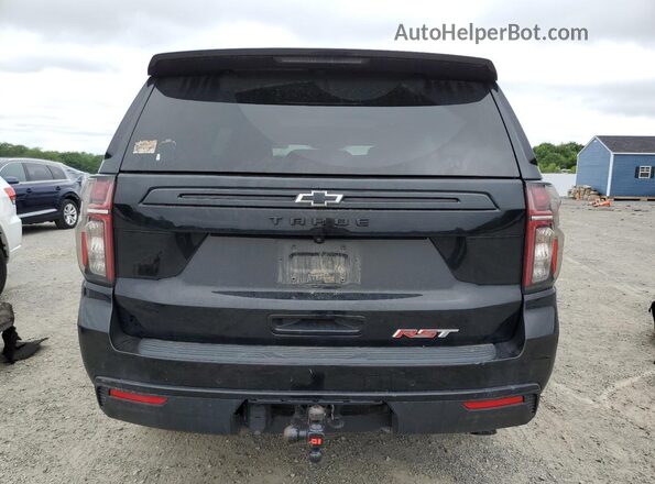 1GNSKRKDXPR130047 2023 CHEVROLET TAHOE Black Rear view