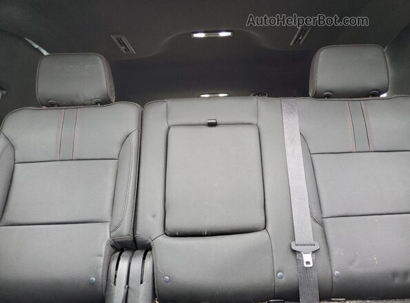 1GNSKRKDXPR130047 2023 CHEVROLET TAHOE Black Rear seats view