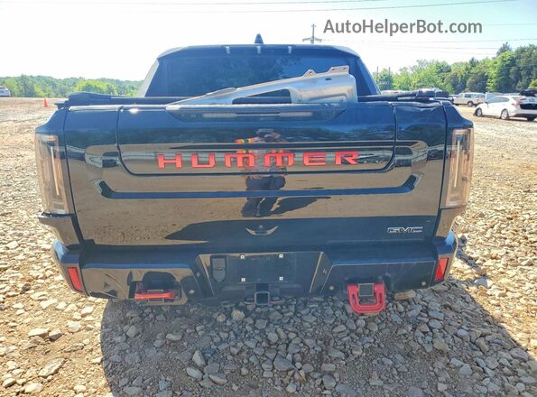 1GT10DDB4RU100972 2024 GMC HUMMER Black Vista trasera