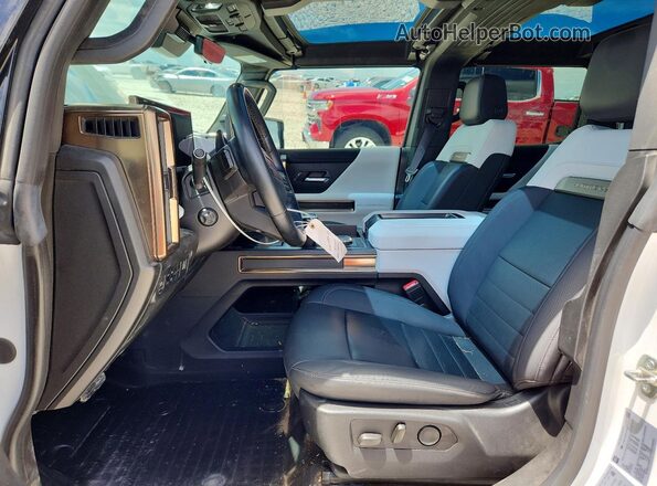 1GT40FDA9NU100217 2022 GMC HUMMER Green წინა სალონის ხედი