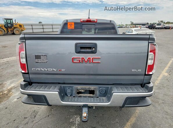 1GTG5CEN2J1297063 2018 GMC CANYON Серый Вид сзади