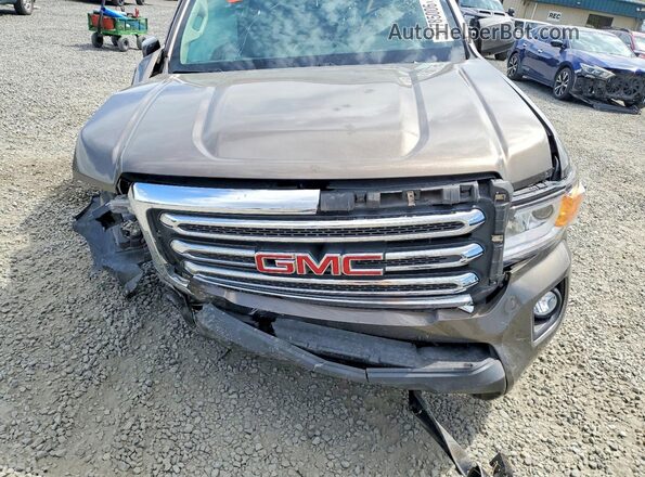 1GTG6CE3XG1188581 2016 GMC CANYON Tan Widok wnętrza z tyłu