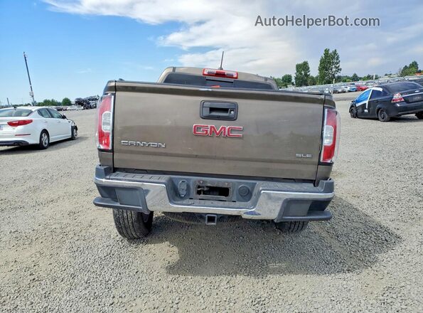 1GTG6CE3XG1188581 2016 GMC CANYON Tan Widok z tyłu