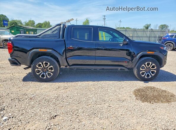 1GTP2DEK9S1228893 2025 GMC CANYON Black Widok komory silnika