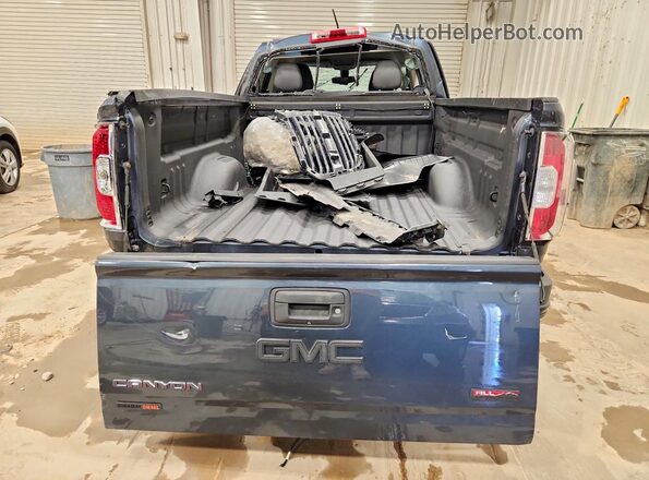 1GTP6FE16K1171012 2019 GMC CANYON Blue Вид ззаду