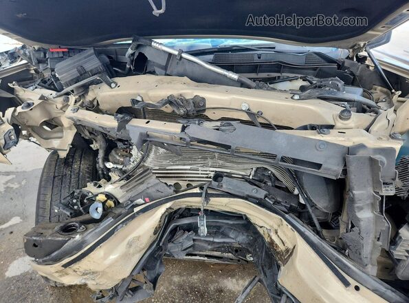 1GTPHCEK9PZ106228 2023 GMC SIERRA Tan Սալոնի հետևի տեսք