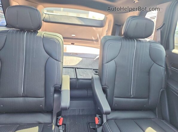 1GYC3NML2TZ705303 2026 CADILLAC VISTIQ Gray Vista de los asientos traseros