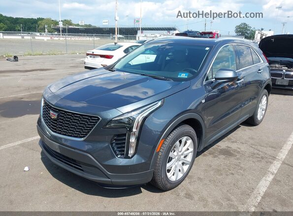 1GYFZBR41MF009028 2021 CADILLAC XT4 Серый Передняя левая четверть