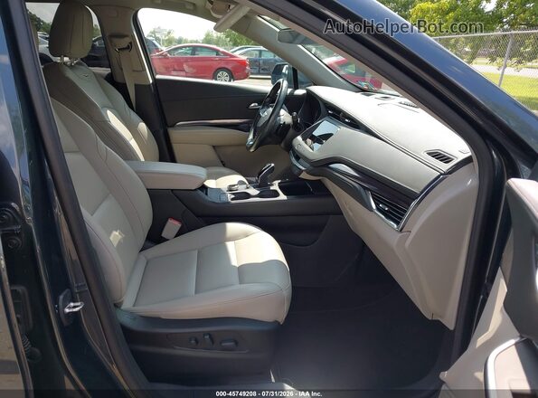 1GYFZBR41MF009028 2021 CADILLAC XT4 Серый Вид салона спереди