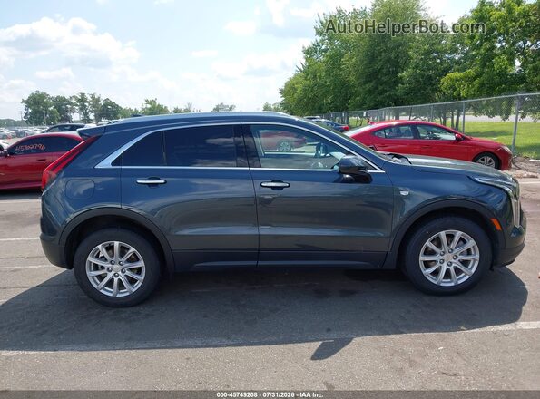 1GYFZBR41MF009028 2021 CADILLAC XT4 Серый Вид задней части салона