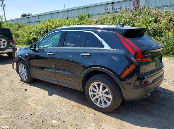 1GYFZBR49MF083510 2021 CADILLAC XT4 Black Trasero izquierdo
