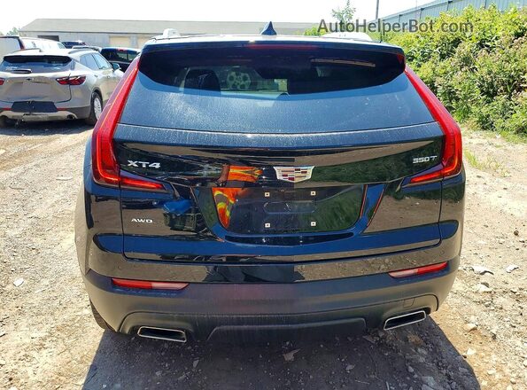 1GYFZBR49MF083510 2021 CADILLAC XT4 Black Vista trasera