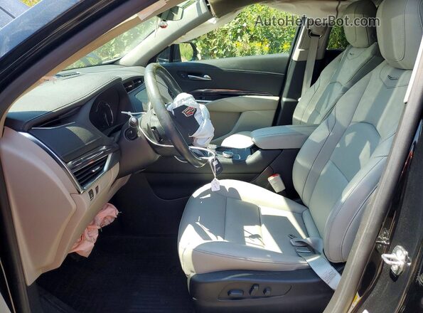 1GYFZBR49MF083510 2021 CADILLAC XT4 Black Vista interior delantera