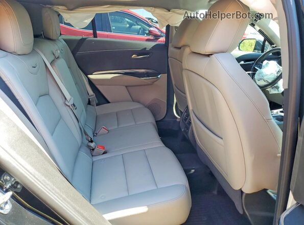 1GYFZBR49MF083510 2021 CADILLAC XT4 Black Vista interior trasera