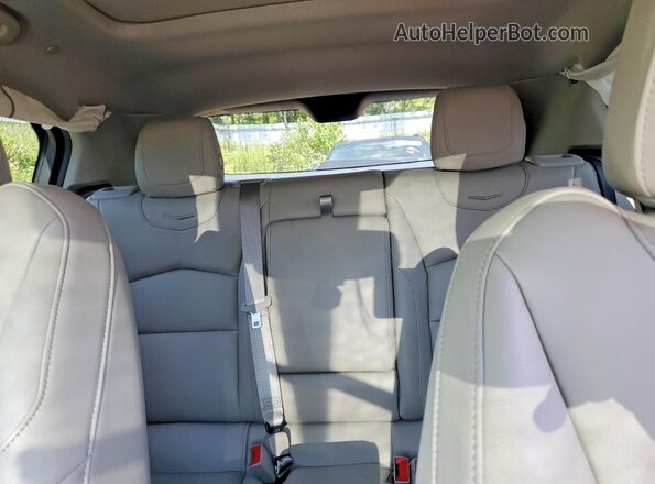 1GYFZBR49MF083510 2021 CADILLAC XT4 Black Vista de los asientos traseros
