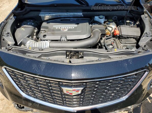 1GYFZBR49MF083510 2021 CADILLAC XT4 Black Vista del compartimento del motor