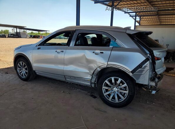 1GYFZCR40MF011696 2021 CADILLAC XT4 Silver Trasero izquierdo