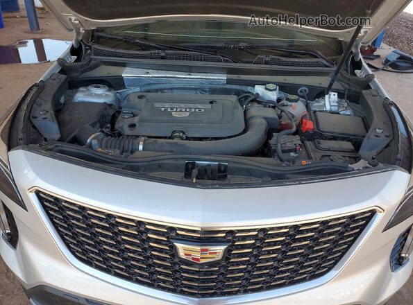 1GYFZCR40MF011696 2021 CADILLAC XT4 Silver Vista interior trasera