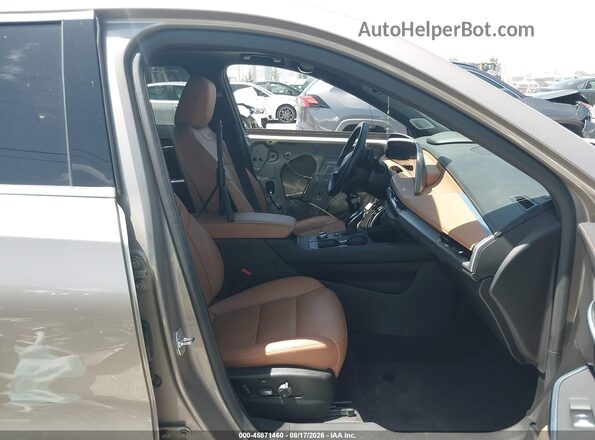 1GYFZCR40SF126876 2025 CADILLAC XT4 Бежевый Вид салона спереди