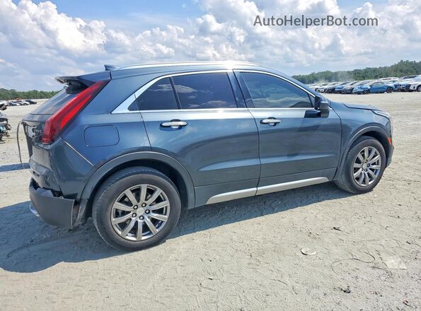 1GYFZCR41MF003946 2021 CADILLAC XT4 Gray Vista trasera