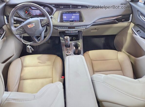 1GYFZCR42KF199845 2019 CADILLAC XT4 Синий Вид панели приборов