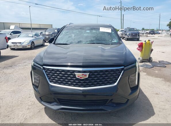 1GYFZCR49RF101419 2024 CADILLAC XT4 Black Вид задньої частини салону