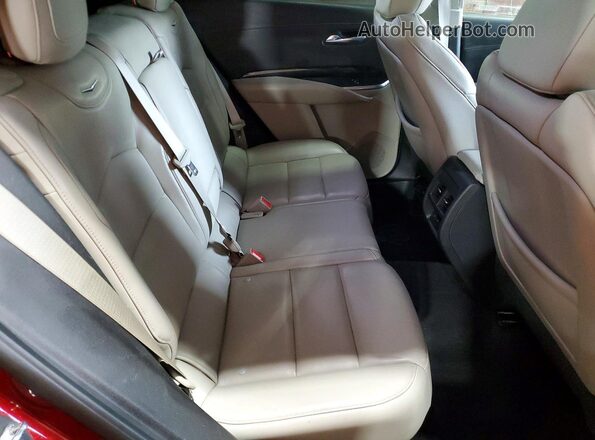 1GYFZDR40KF229009 2019 CADILLAC XT4 Burgundy Vista interior trasera
