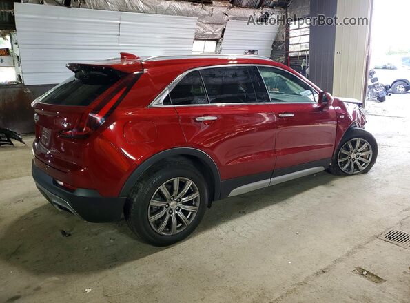 1GYFZDR40KF229009 2019 CADILLAC XT4 Burgundy Trasero derecho