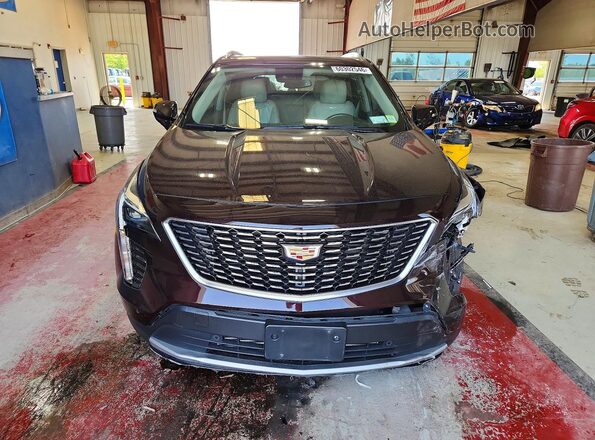 1GYFZDR40MF055834 2021 CADILLAC XT4 Burgundy Вид спереду