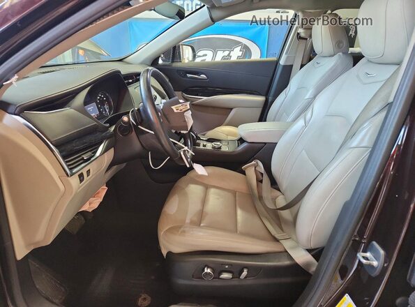 1GYFZDR40MF055834 2021 CADILLAC XT4 Burgundy Вид салону спереду