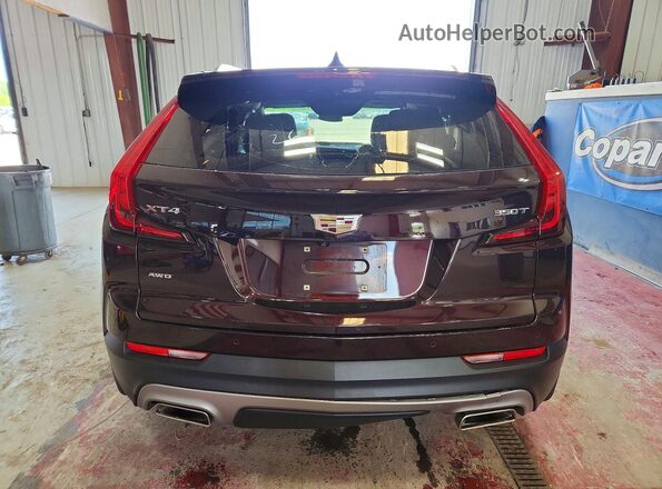 1GYFZDR40MF055834 2021 CADILLAC XT4 Burgundy Вид ззаду
